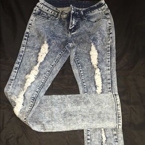Acid washed ripped jeans